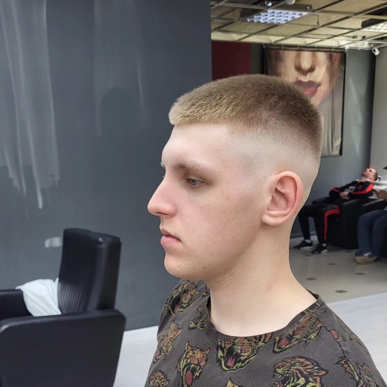 Short buzz cut with a skin fade — side view